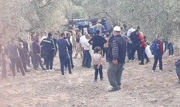 Devrilen traktörün altında can verdi 