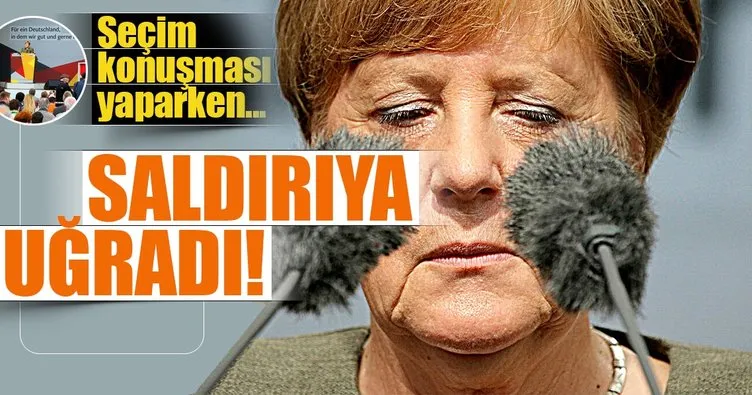 Seçim konuşması yapan Merkel’e domatesli saldırı