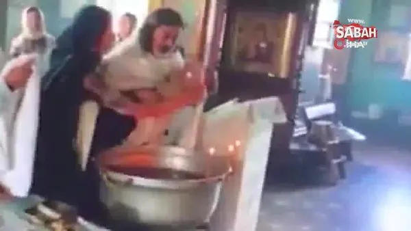 Kilisede yeni doğan bebeğe vaftiz sırasında papazdan işkence!