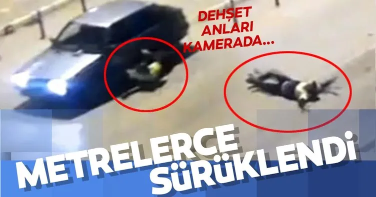 İzmir’de şaşkına çeviren görüntü! Polisi aracın ön kaputunda sürükledi!