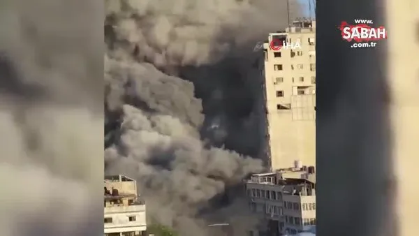 İsrail, Gazze'de medya ofislerinin bulunduğu 12 katlı binayı vurdu | Video