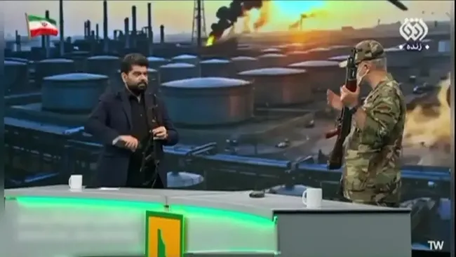 iran-devlet-televizyonunda-carpici-goruntuler-silah-kullanimini-anlattilar-1778958168381.jpeg