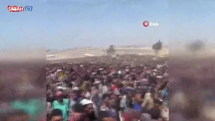 Açlıkla savaşan Gazzeliler yardım tırlarına akın etti | Video