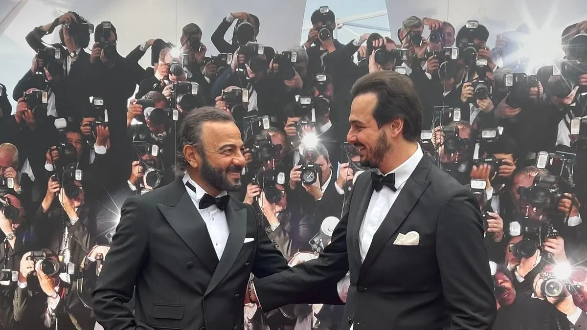 Kırmızı halıda karizma rüzgarı! Kerem Alışık oğlu Sadri ile birlikte Cannes Film Festivali'nde! Baba oğulun benzerliğine bakın!