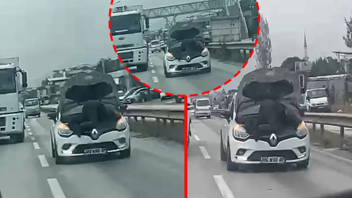 Bursa’da panik dolu anlar! Kaputu açık otomobilin üzerinde seyahat etti: Canını hiçe sayıp...