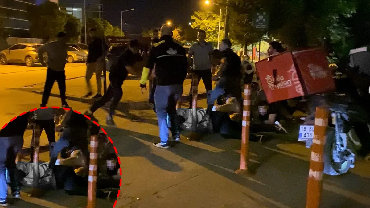 Bursa'da motokuryeler ile işletme sahipleri arasındaki kavga anı.