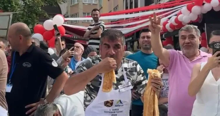 Bursa’da ilginç yarışma: 11 metre uzunluğundaki böreği 5 dakikada yedi!