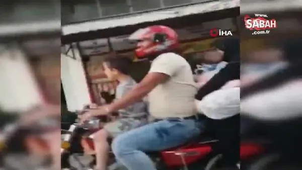 Motosiklete 5 kişi binen ailenin tehlikeye aldırış etmeden yaptığı yolculuk kamerada