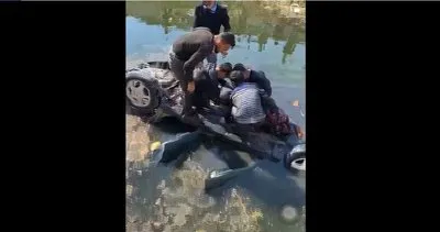 Su kanalına uçan otomobilin sürücüsünü vatandaşlar çıkardı #mersin