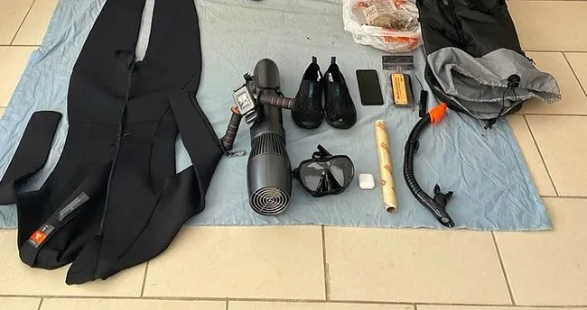 Sualtı scooter ile yakalandı