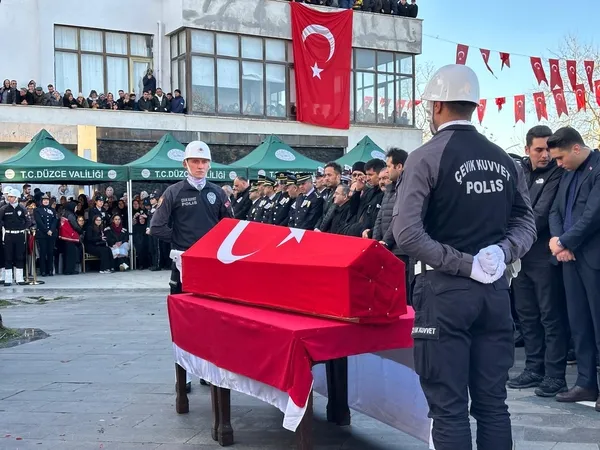 duzce-sehidine-veda-etti-sehit-polis-memuru-turgut-kulunk-son-yolculuguna-ugurlandi-1767101878573.jpg
