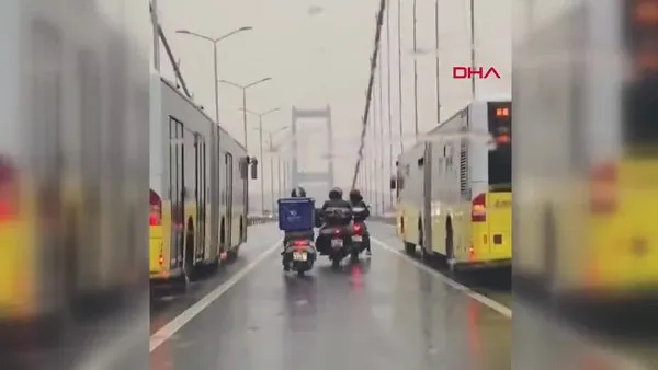 İstanbul 15 Temmuz Şehitler Köprüsü'nde 4 motosikletliyi rüzgardan koruyan otobüsler kamerada