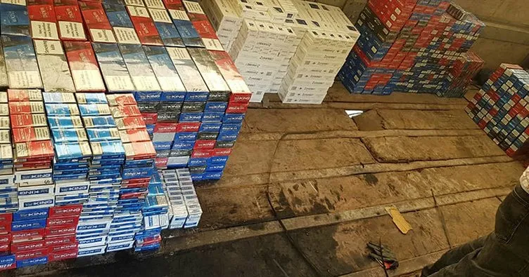 Şanlıurfa’da halı yüklü kamyonette kaçak sigaraya gözaltı