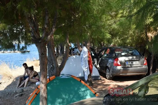 Marmaris'te boş oda bulamayanlar sahillerde çadır kurdu