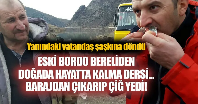 Barajda tuttuğu balığı çiğ yedi