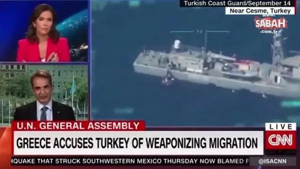 CNN, Kiryakos Miçotakis konuşurken geri itilen göçmenleri gösterdi | Video