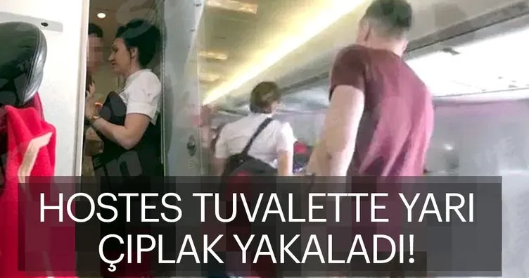 Uçağın tuvaletinde cinsel ilişkiye girerken hostes yakaladı!