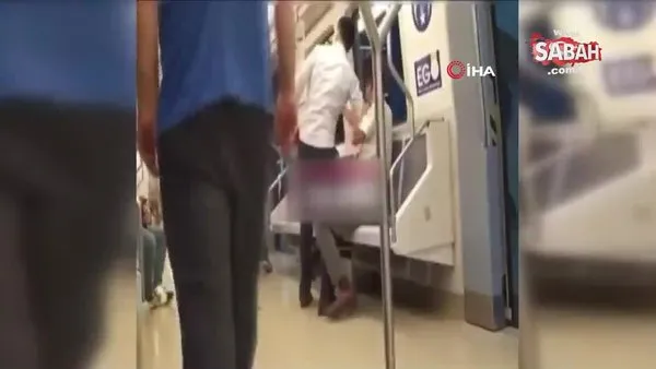 Ankara metrosunda bir yolcunun şarkı söyleyen adamın gırtlağına yapıştığı anlar kamerada | Video