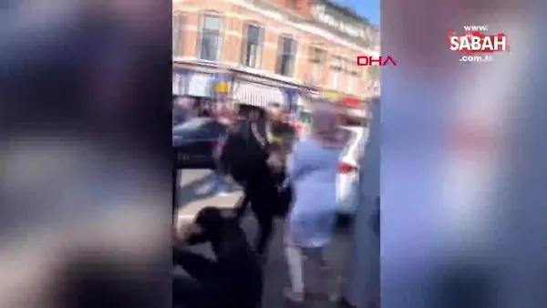 Hollanda polisinin başörtüsü kadını tekmeleyip, yumruklaması büyük tepki çekti