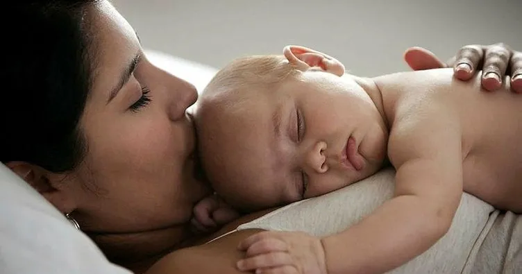 Sırtını sıvazlamak bebekte ağrı kesici etkisi yapıyor