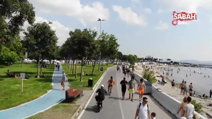 Sıcak havanın tadını Caddebostan Sahili'nde çıkardılar | Video