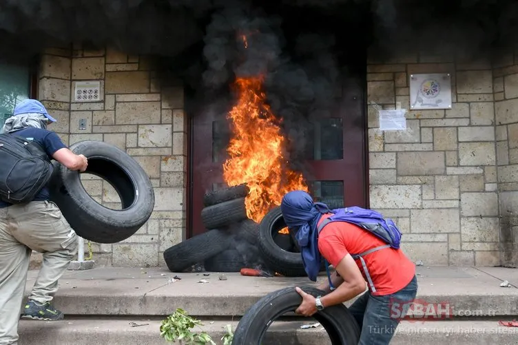Honduras karıştı! ABD Büyükelçiliğinin kapısını ateşe verdiler