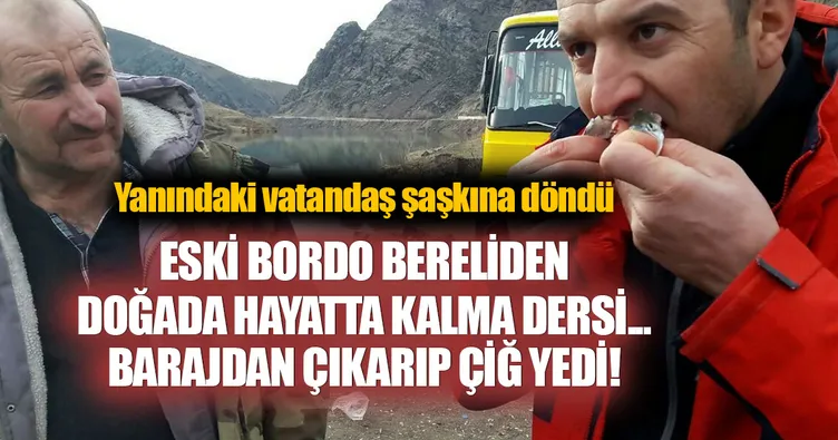 Barajda tuttuğu balığı çiğ yedi