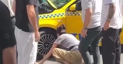 Büşra Develi’den asfaltta canhıraş mücadele! Taksiye sıkışan kediyi böyle kurtardı