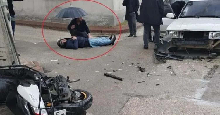 Yer Bursa: Şemsiyeyle yaralının başında bekledi