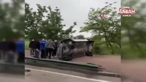 Kontrolden çıkan otomobil yan yattı, sürücüyü araçtan vatandaşlar çıkarttı | Video