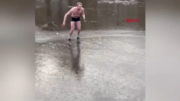 Hollanda'da donmuş su üzerinde iç çamaşırı ile paten yapan çılgın adamın suya gömülme anı kamerada | Video