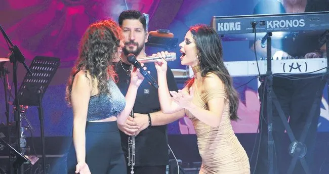 Şarkıcı Simge böcekten korktu klarnetçiye sığındı Şarkıcı Simge böcekten korktu klarnetçiye sığındı