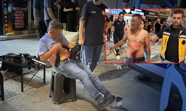 Aksaray’da karnından bıçakla yaralandı! Polislere bağırıp yol ortasında soyundu
