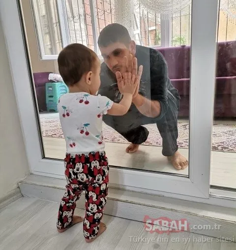 Yürek sızlatan görüntü! 2 yaşındaki kızını camın arkasından seviyor