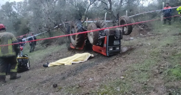 Devrilen traktörün altında kaldı