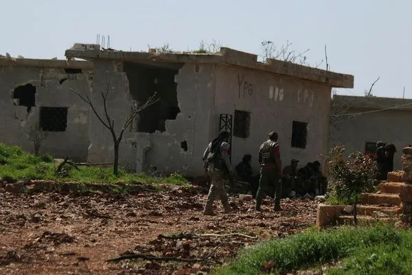 Afrin'in Racu beldesinde arama tarama çalışmaları sürüyor
