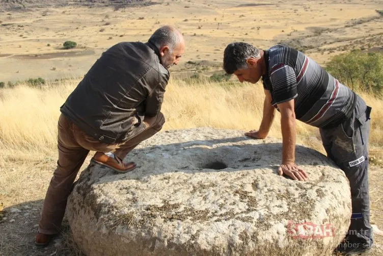 Tarlada gömülü 150 yıllık değirmen taşı bulundu