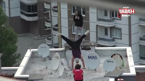 Bursa'da gençlerden binanın çatısında ölümü hiçe sayan akılalmaz gösteri | Video