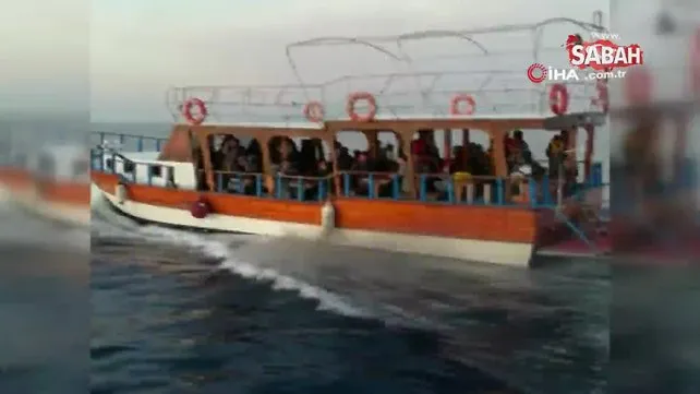 Tur teknesine turist gibi bindiler, Yunanistan'a kaçarken yakalandılar