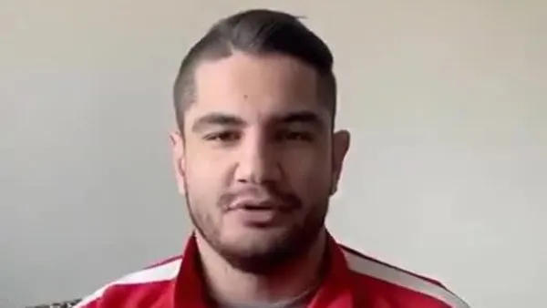 Milli güreşçi Taha Akgül'den işitme engelli sporculara 'Evde kal' mesajı