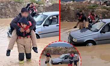Hatay’da yürekleri ısıtan olay! İtfaiyeci mahsur kalan çocuğu böyle kurtardı #hatay