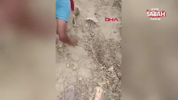 Hindistan'da canlı olarak gömülen bebeğin kurtarılma anı kamerada | Video