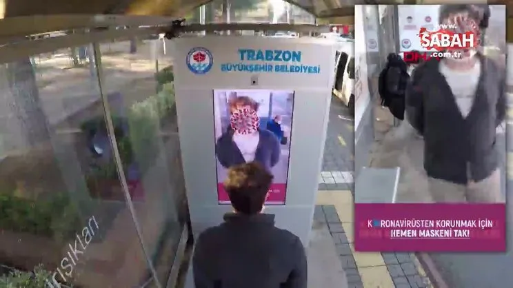 Durakta maske takmayanları uyaran yapay zeka ekranına ilgi | Video