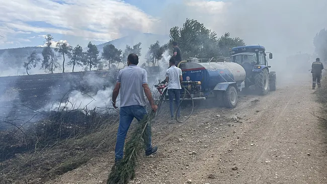 bilecikteki-orman-yanginina-mudahale-ediliyor-dumanlar-kent-merkezinde-goruldu-1751383335764.jpeg