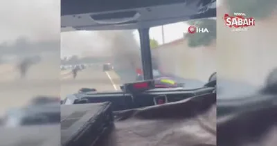 ABD polisi otoyolda yanan aracın sürücüsünü kurtardı | Video