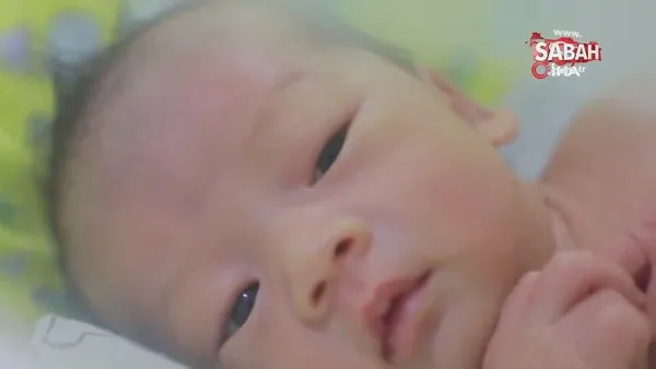 Çin'de annesinin karnında ölümcül koronavirüse yakalanıp kurtulan bebek ilk kez görüntülendi | Video