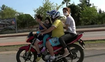 Motosiklet üzerinde 2’si çocuk 4 kişinin tehlikeli yolculuğu kamerada
