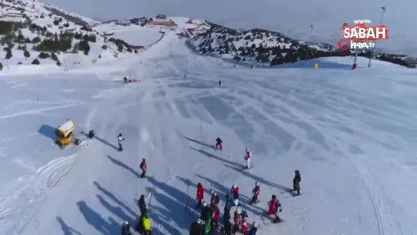 Göl manzaralı Ergan Dağında kayak keyfi | Video