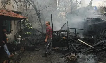 Samanlıktaki yangın eve sıçradı, otomobili komşular kurtardı