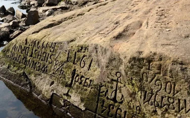 Sular çekilince 600 yıllık yazı ortaya çıktı! Tüm dünyayı korkutan uyarı: Beni görürsen ağla